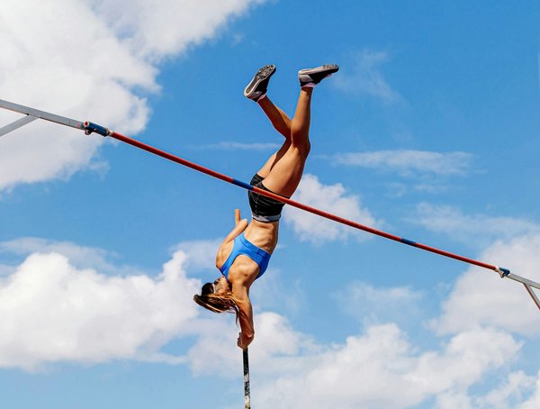 What Are the Specific Training Techniques for Optimizing Pole Vaulting Form?